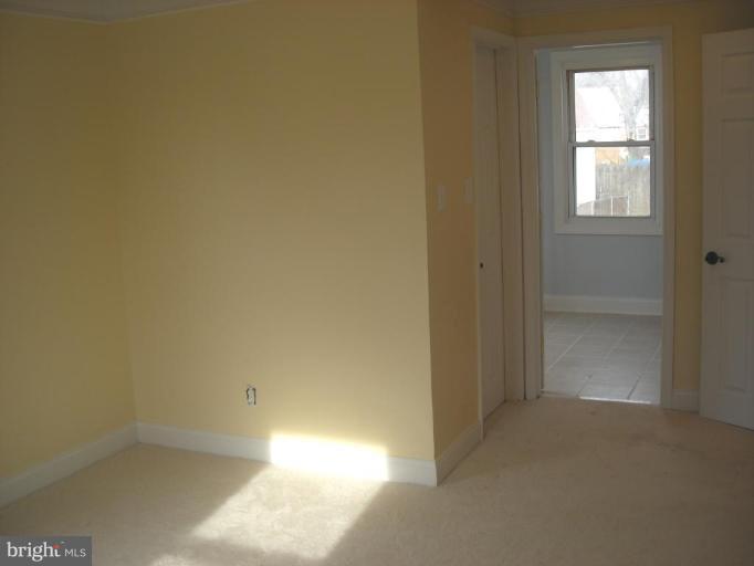 1220 Hilldale Road Rosedale, MD 21237 - Photo 14 of 19 an empty room with windows
