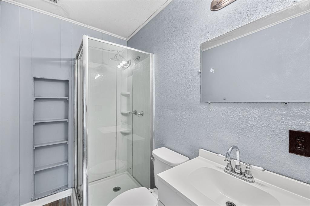 709 Sissom Road Killeen, TX 76541 - Photo 16 of 24 a bathroom with a sink toilet and shower