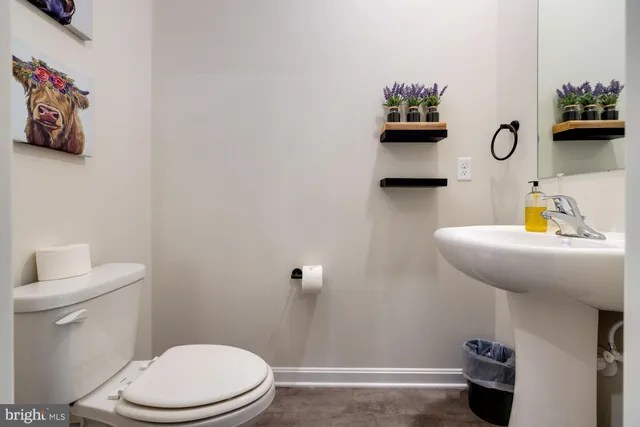 a living room with furniture and rug