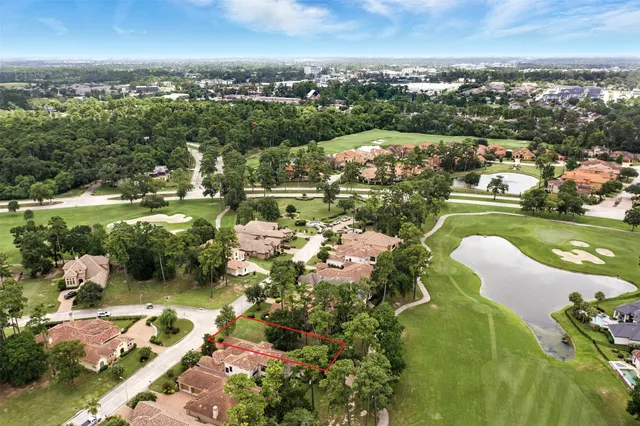 a view of a lake with a city