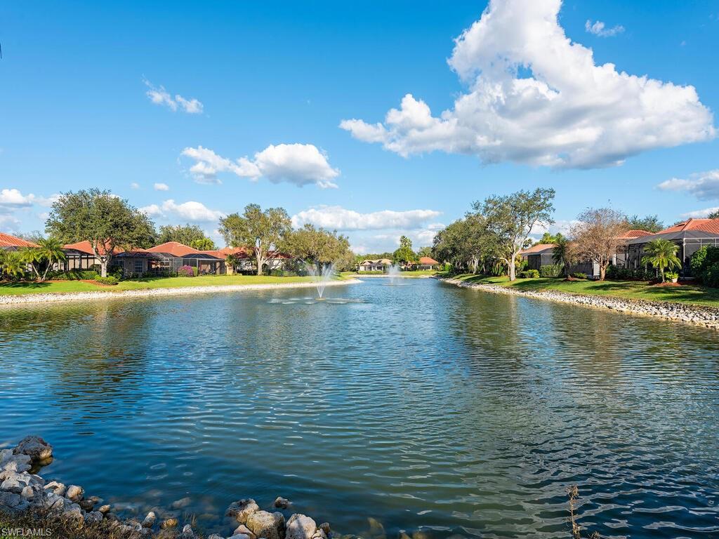 963 Fountain Run Naples, FL 34119 - Photo 11 of 12 a view of an ocean with boats and trees