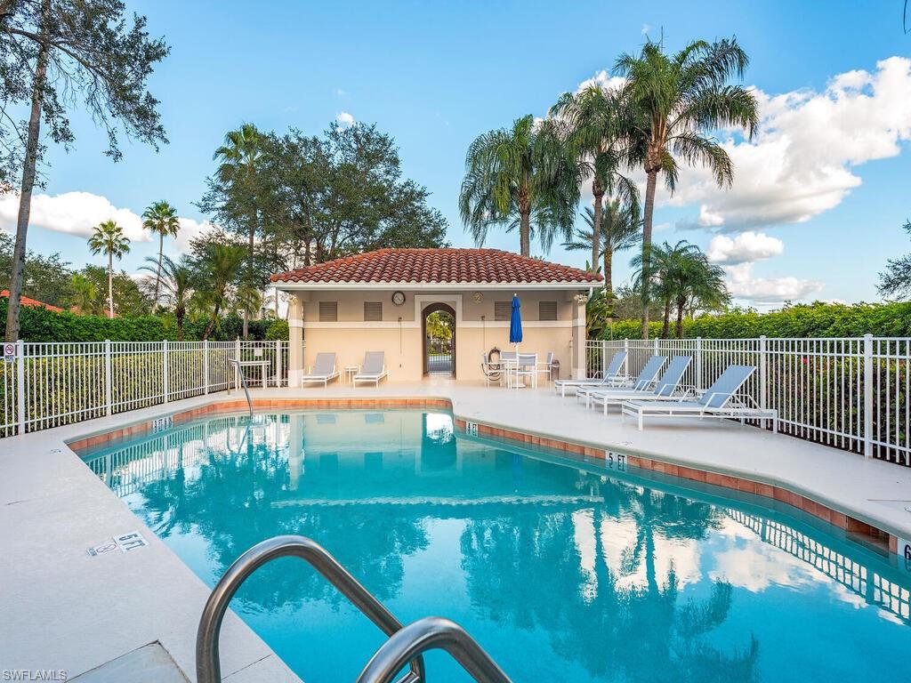 963 Fountain Run Naples, FL 34119 - Photo 12 of 12 a view of a house with swimming pool
