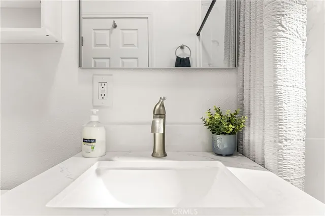 a white bath tub sitting in a bathroom
