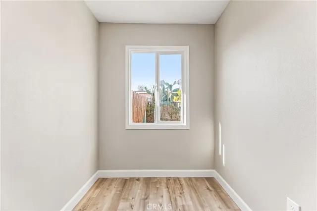 a view of a room that has a window in it