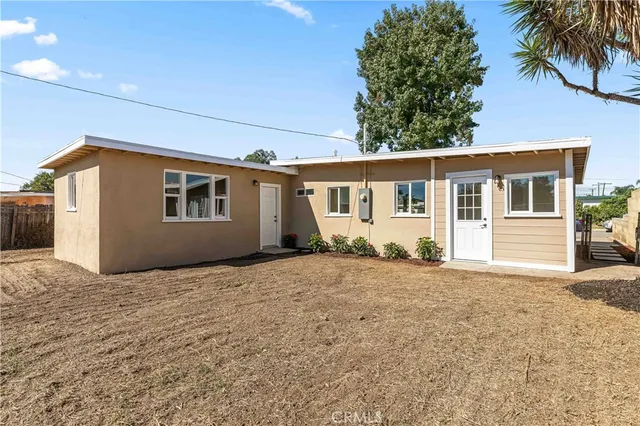 a view of a house with a patio