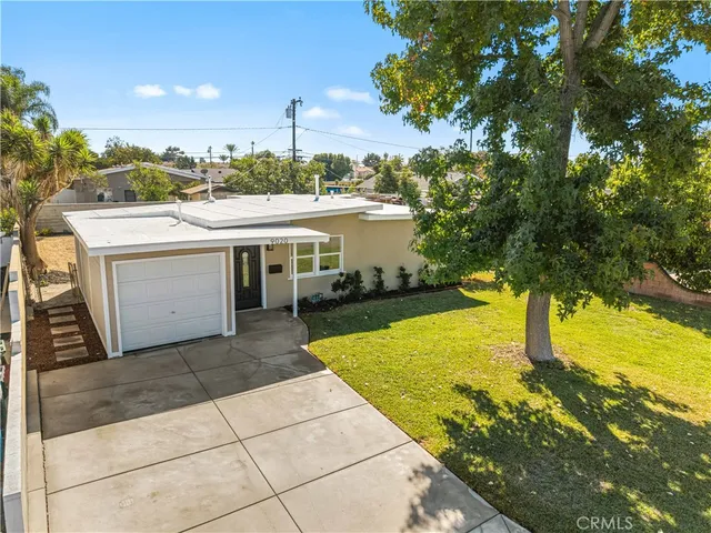 a view of a patio with swimming pool