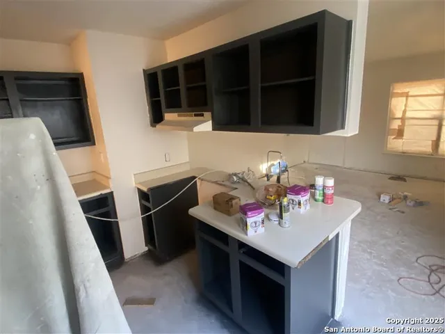 a view of a room with a window