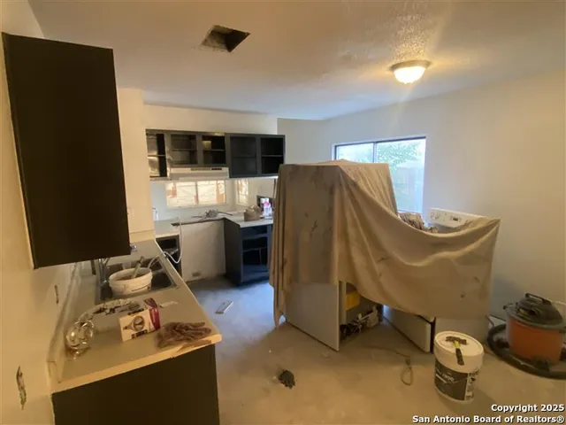 a bathroom with a bathtub and shower