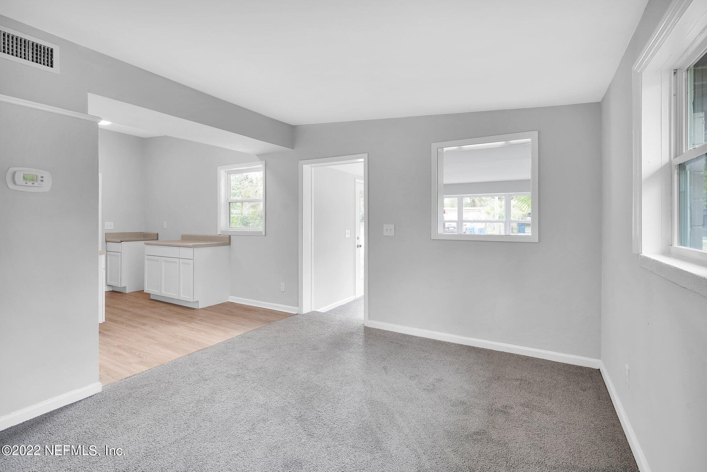 6715 Morgana Road North Jacksonville, FL 32211 - Photo 12 of 27 an empty room with windows and closet