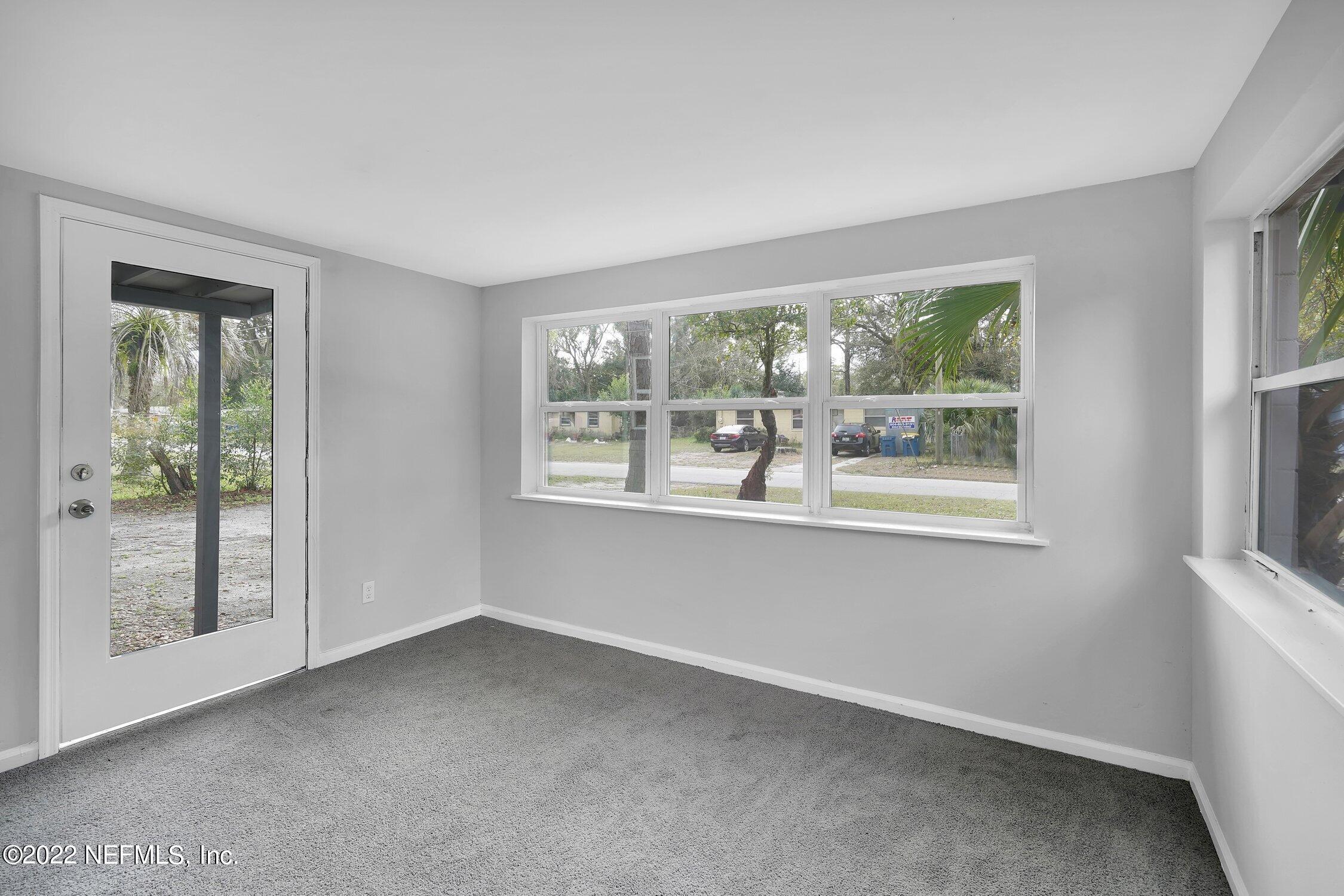 6715 Morgana Road North Jacksonville, FL 32211 - Photo 5 of 27 an empty room with windows
