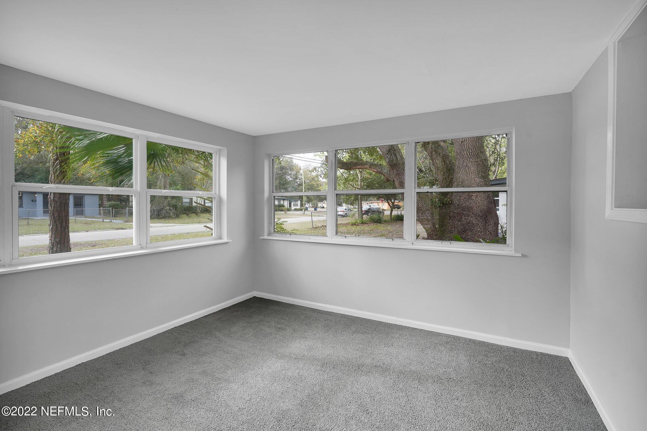 6715 Morgana Road North Jacksonville, FL 32211 - Photo 6 of 27 an empty room with windows