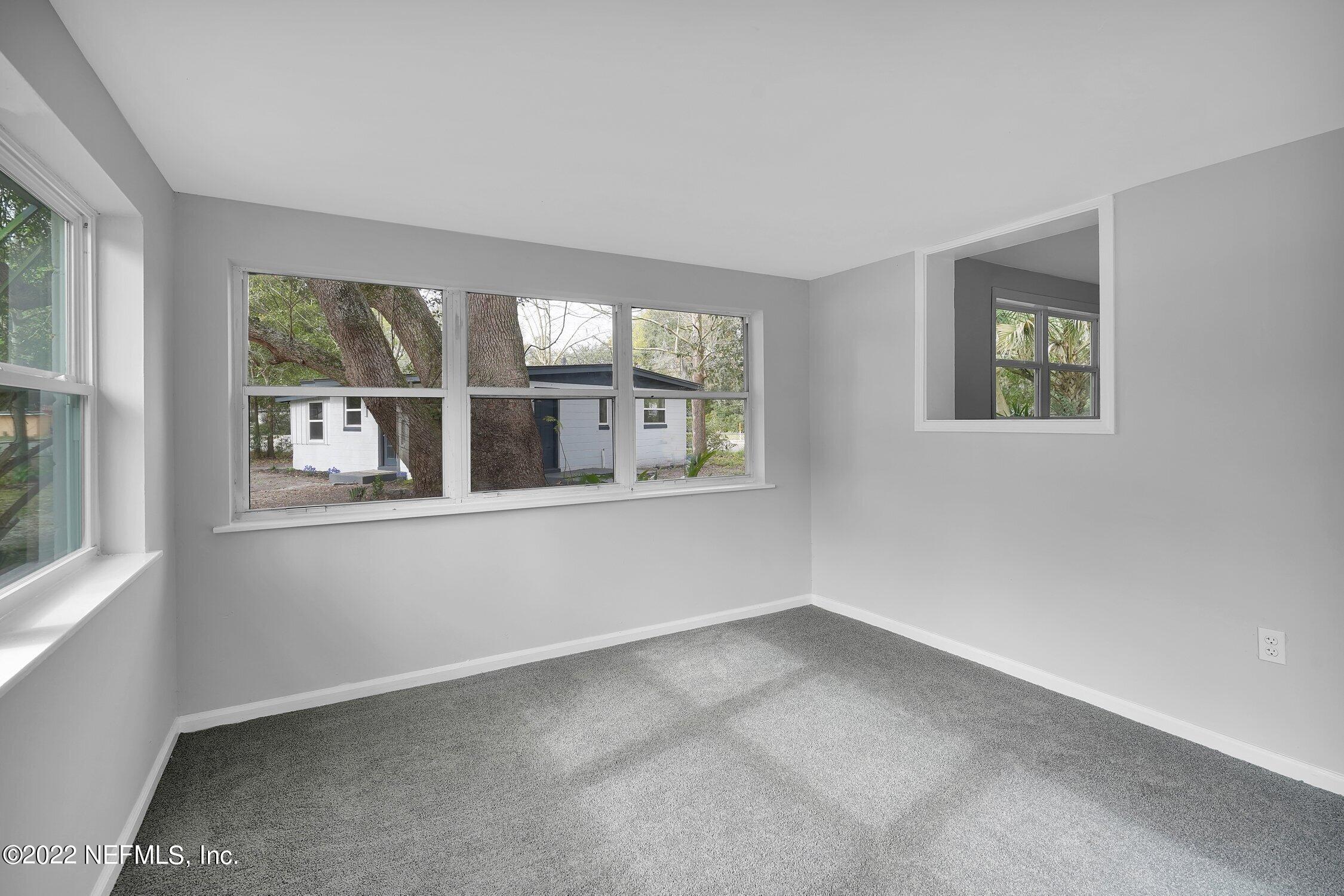 6715 Morgana Road North Jacksonville, FL 32211 - Photo 7 of 27 an empty room with windows