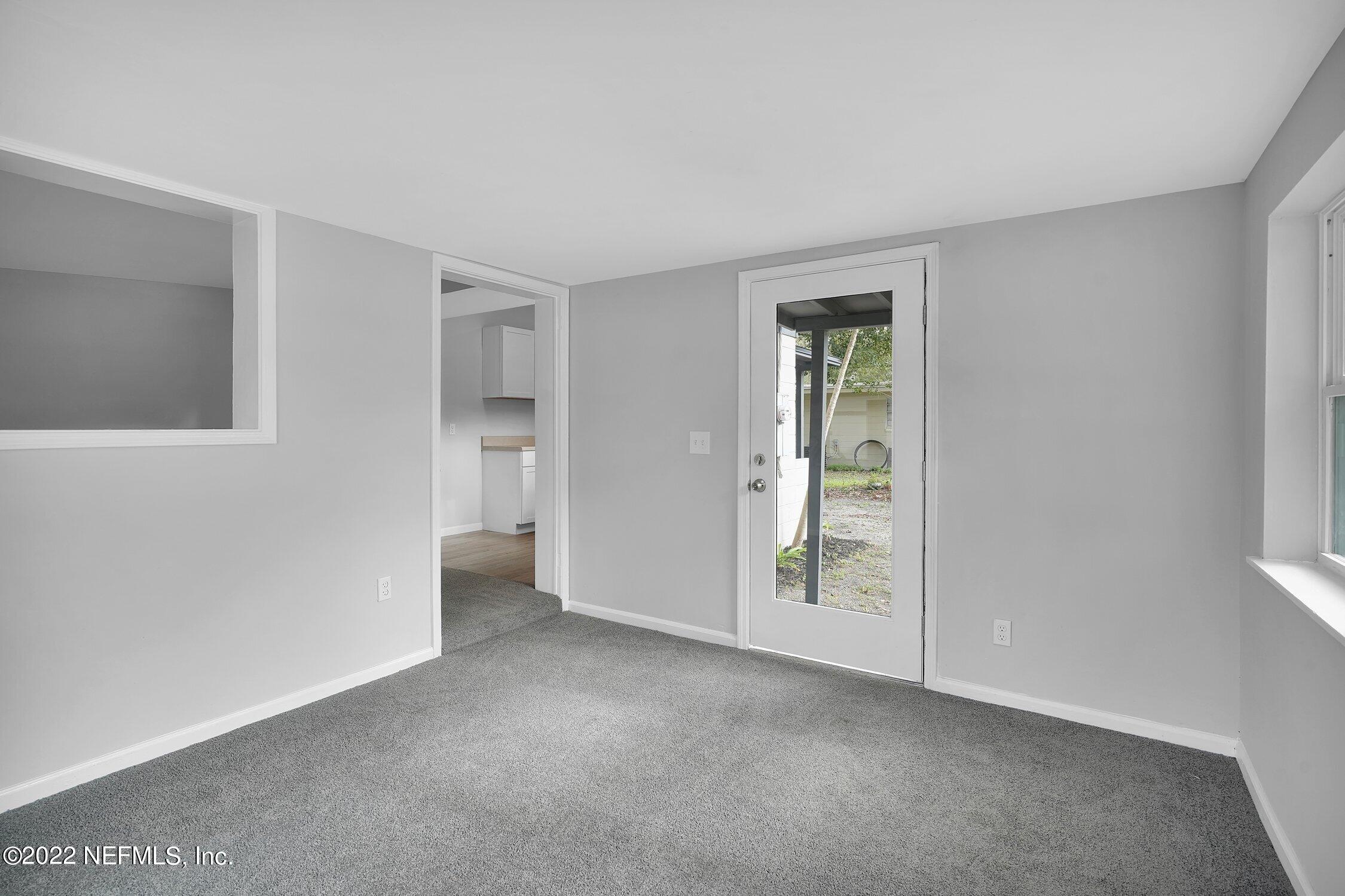6715 Morgana Road North Jacksonville, FL 32211 - Photo 8 of 27 a view of an empty room with closet and a window