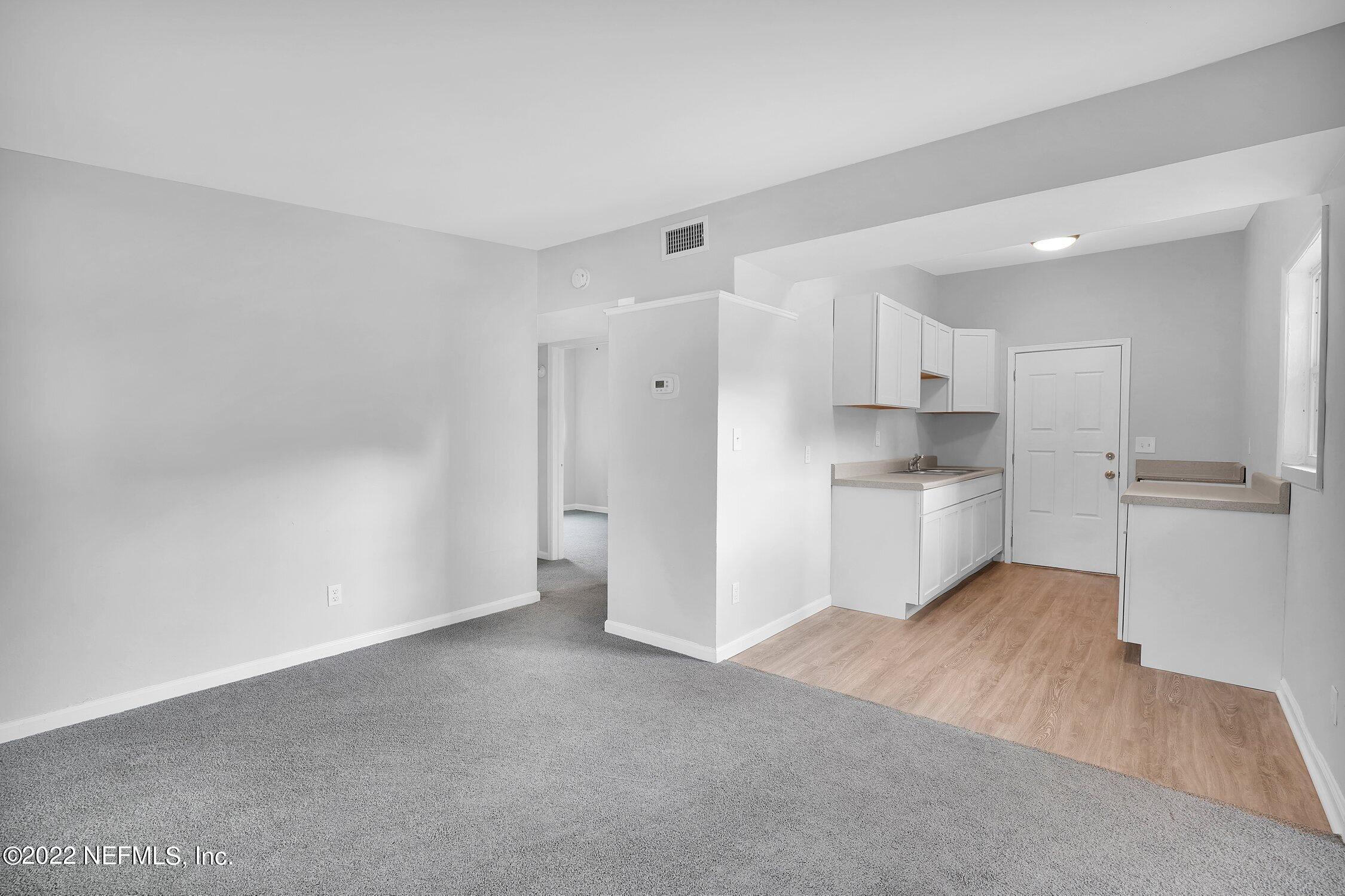 6715 Morgana Road North Jacksonville, FL 32211 - Photo 9 of 27 a view of kitchen with wooden floor