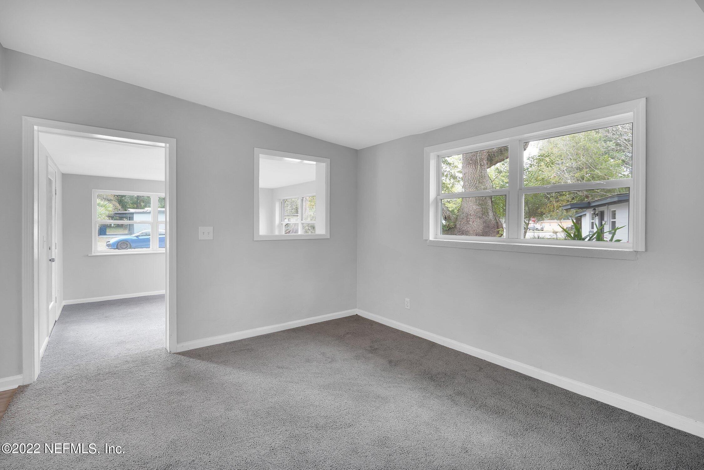 6715 Morgana Road North Jacksonville, FL 32211 - Photo 10 of 27 an empty room with windows