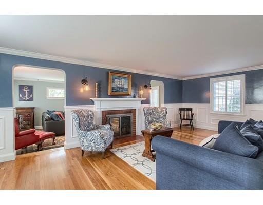 24 Paul Revere Road Needham, MA 02494 - Photo 3 of 30 a living room with furniture and a fireplace
