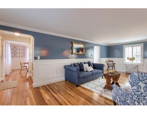 24 Paul Revere Road Needham, MA 02494 - Photo 4 of 30 a living room with furniture and a table