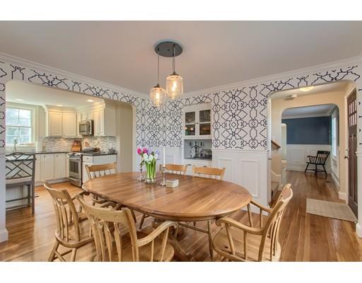 24 Paul Revere Road Needham, MA 02494 - Photo 8 of 30 a view of a dining room with furniture and wooden floor