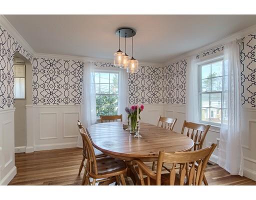 24 Paul Revere Road Needham, MA 02494 - Photo 9 of 30 a view of a dining room with furniture window and wooden floor