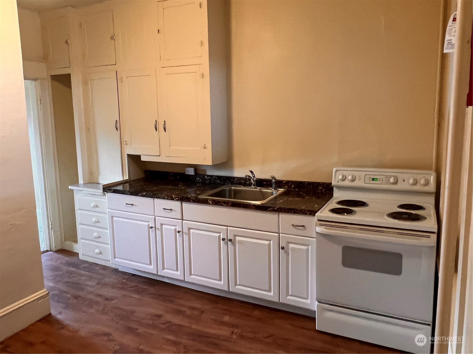 1201 Pacific Avenue Everett, WA 98201 - Photo 12 of 24 a view of a kitchen with stove top oven