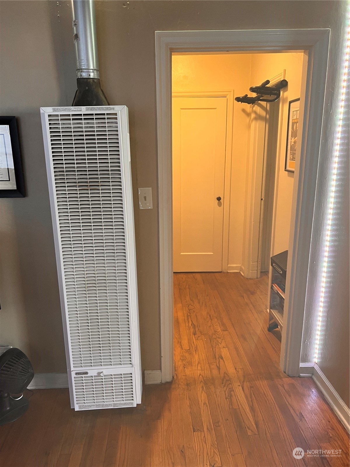 1201 Pacific Avenue Everett, WA 98201 - Photo 14 of 24 a view of empty room with wooden floor and fan