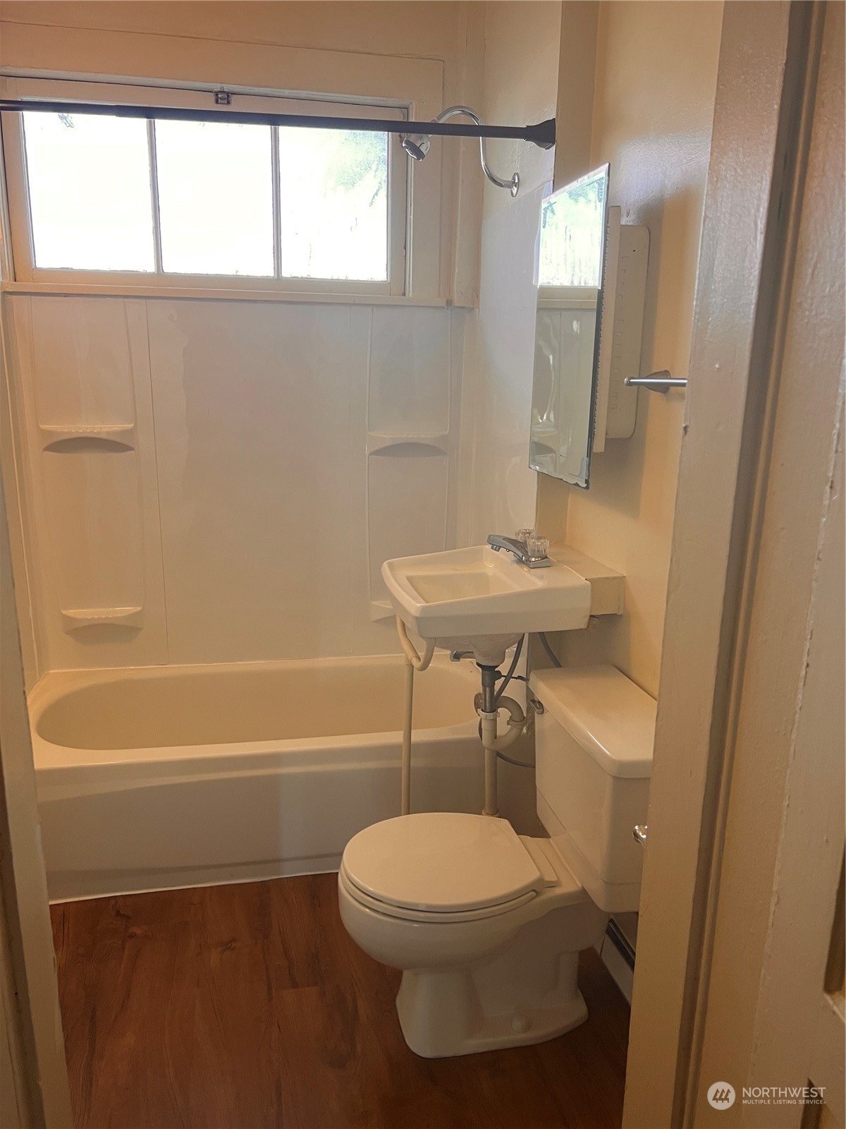 1201 Pacific Avenue Everett, WA 98201 - Photo 15 of 24 a bathroom with a toilet a sink and a bathtub