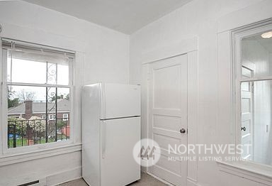 1201 Pacific Avenue Everett, WA 98201 - Photo 18 of 24 a white cabinet sitting next to a window
