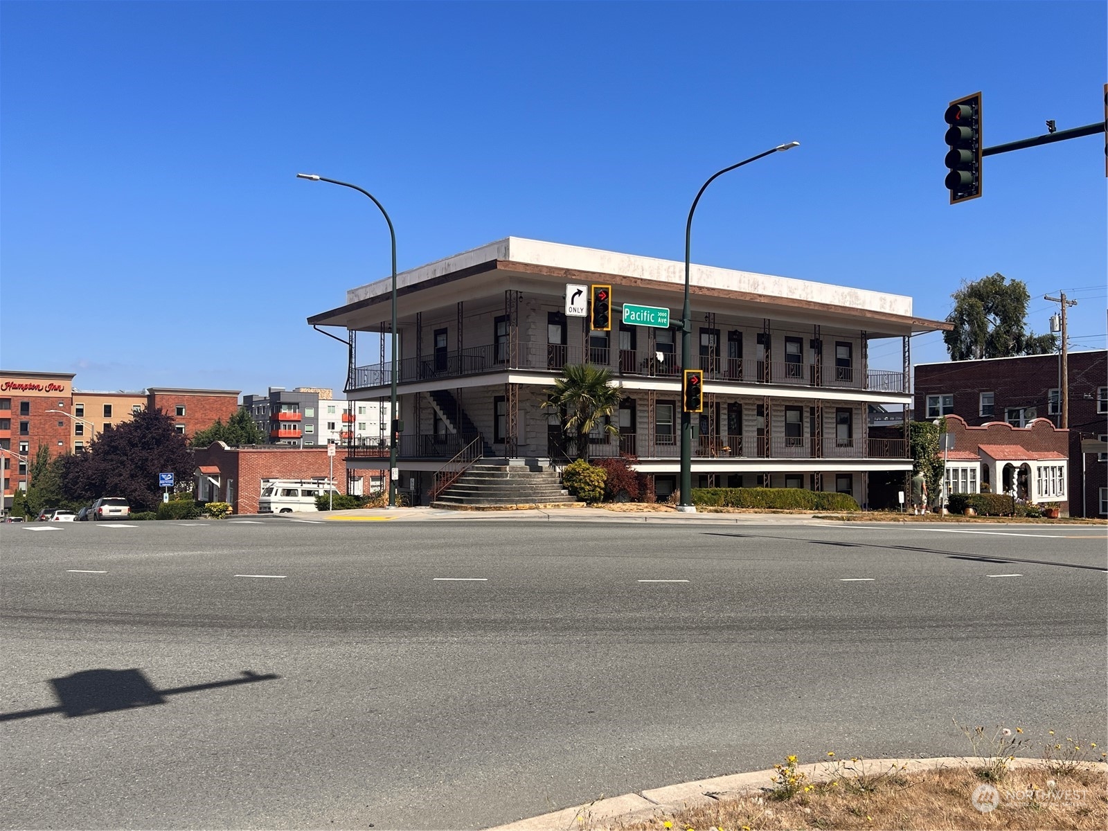 1201 Pacific Avenue Everett, WA 98201 - Photo 2 of 24 a view of a building with cars