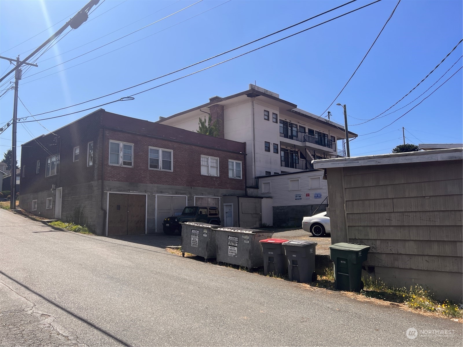 1201 Pacific Avenue Everett, WA 98201 - Photo 9 of 24 a front view of a house with garage
