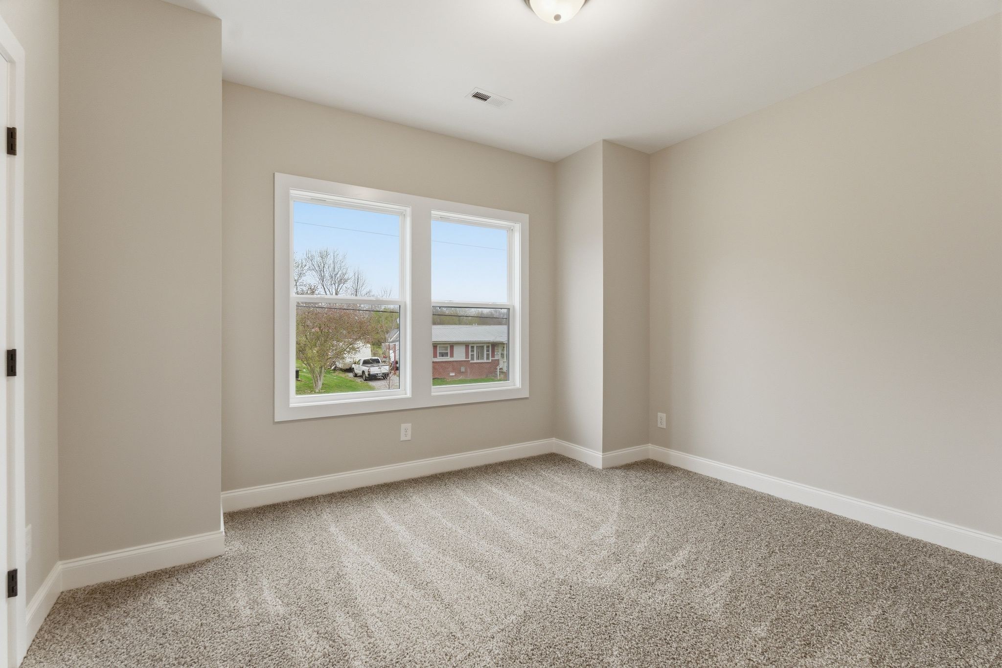 263 West Spring Street Smithville, TN 37166 - Photo 17 of 23 an empty room with windows