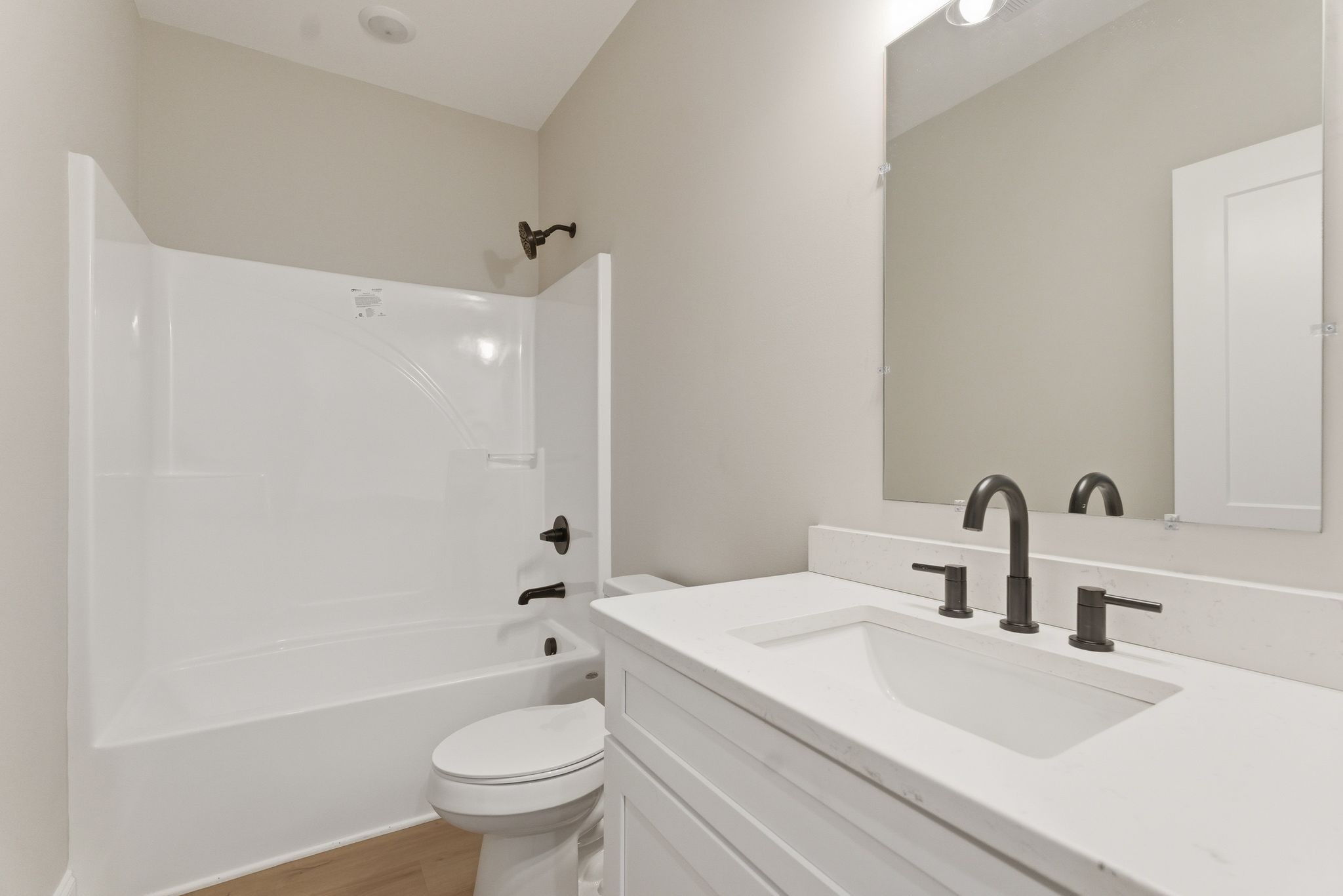 263 West Spring Street Smithville, TN 37166 - Photo 19 of 23 a bathroom with a sink a toilet and a mirror