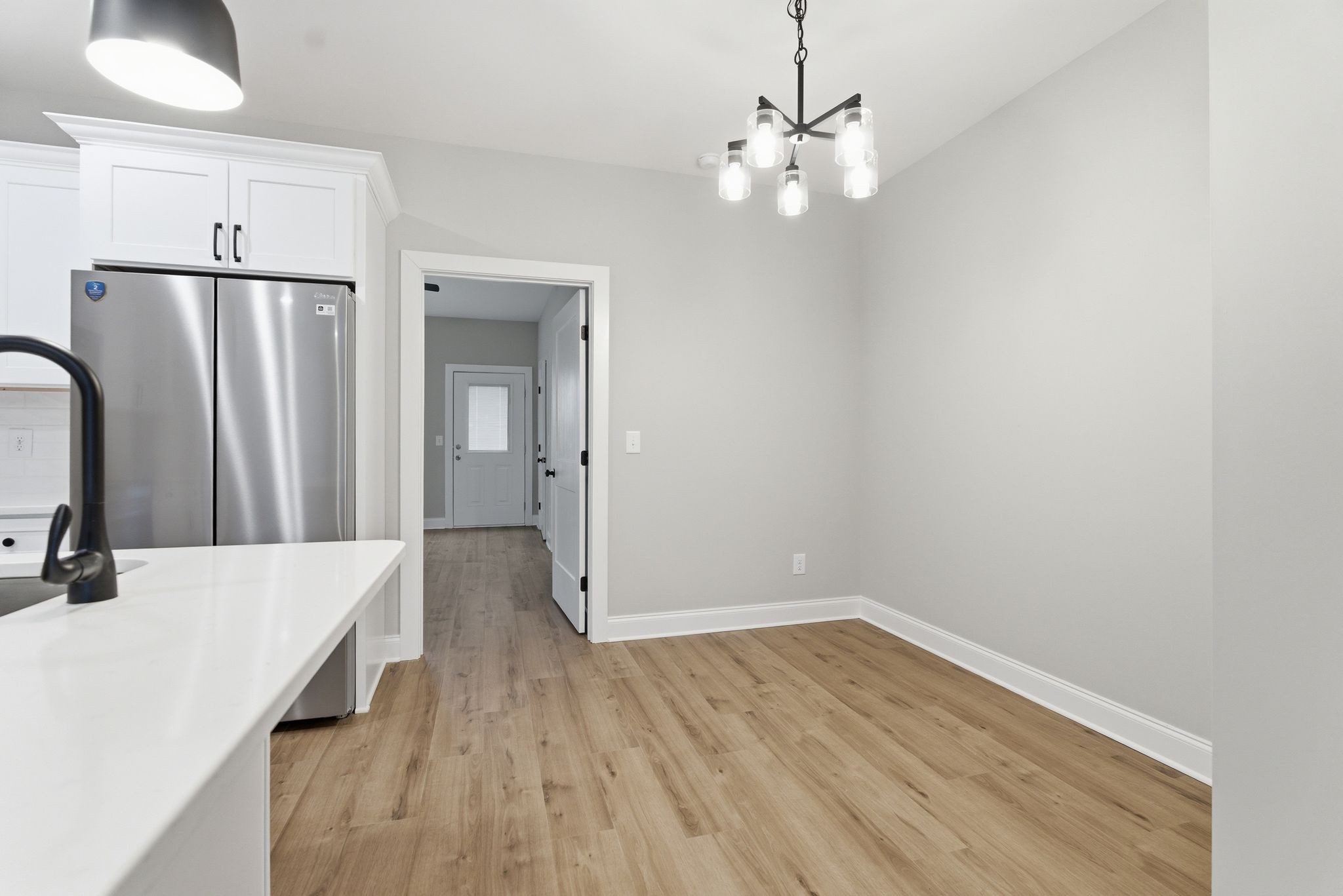 263 West Spring Street Smithville, TN 37166 - Photo 8 of 23 wooden floor in an empty room with a window