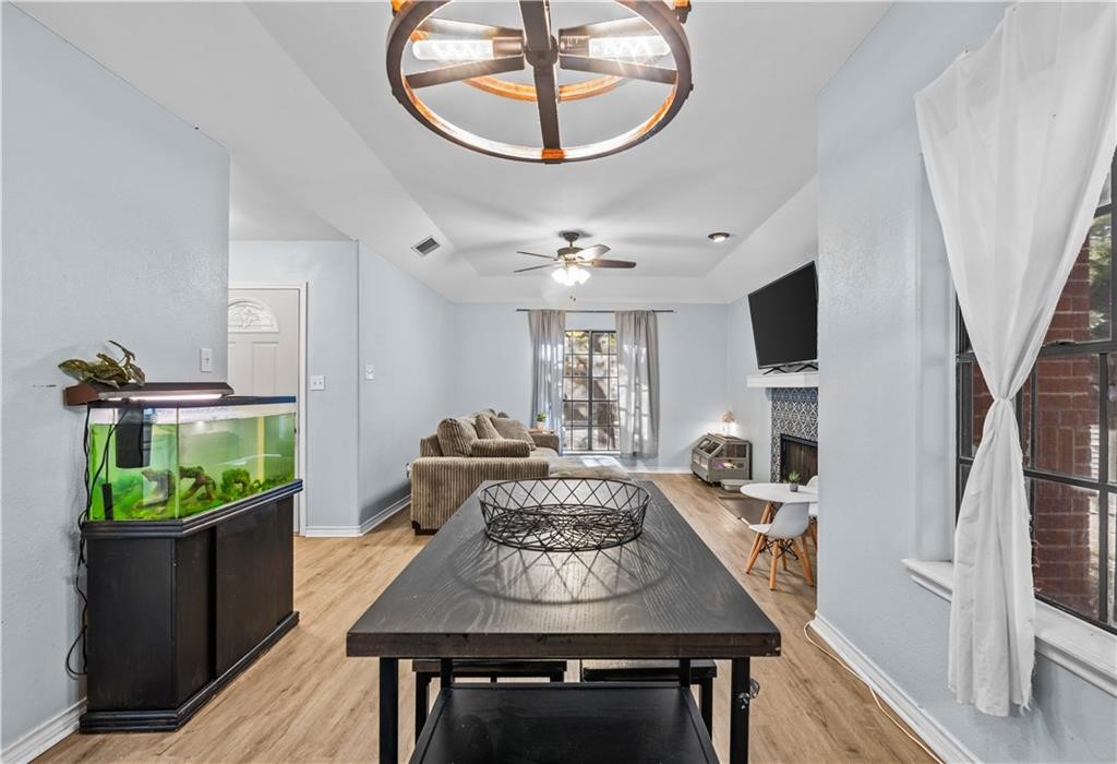 7302 Winding Star Drive Corpus Christi, TX 78413 - Photo 3 of 13 a view of a dining room with furniture window and wooden floor