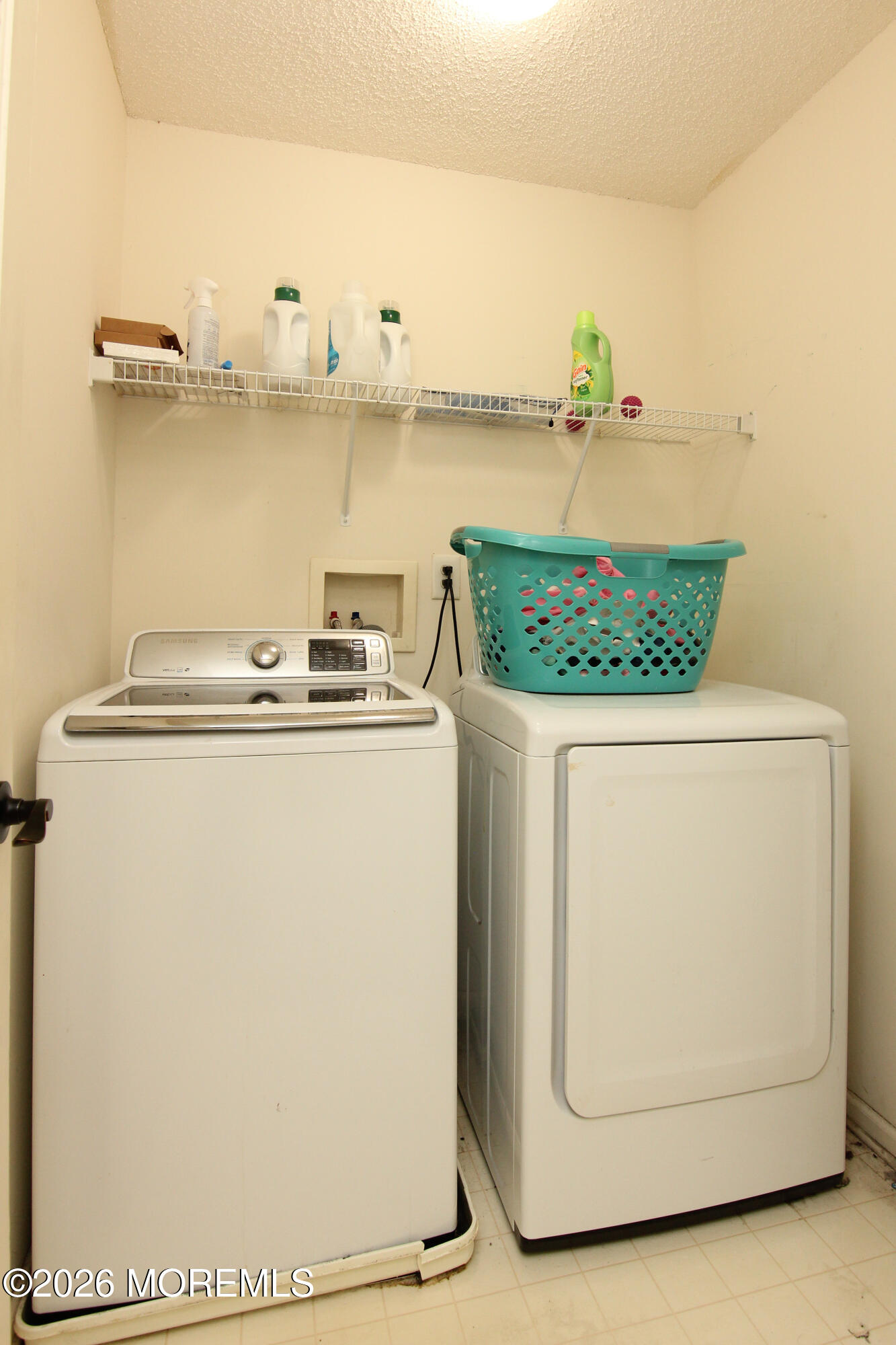 33 Austin Street Tinton Falls, NJ 07712 - Photo 19 of 46 a utility room with dryer and washer