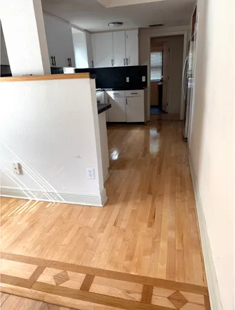 a view of a kitchen with utility area