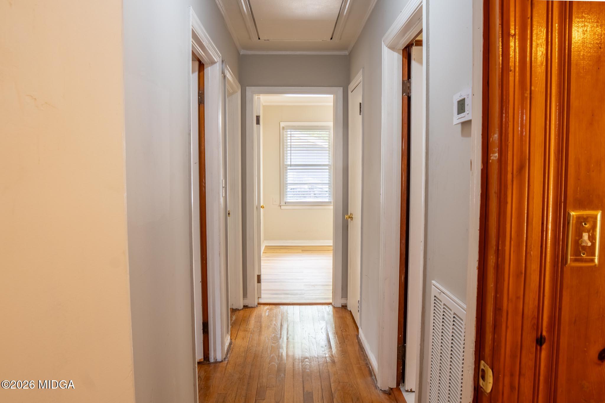 3319 Mohawk Road Macon, GA 31217 - Photo 21 of 38 a view of a hallway with wooden floor and glass doors