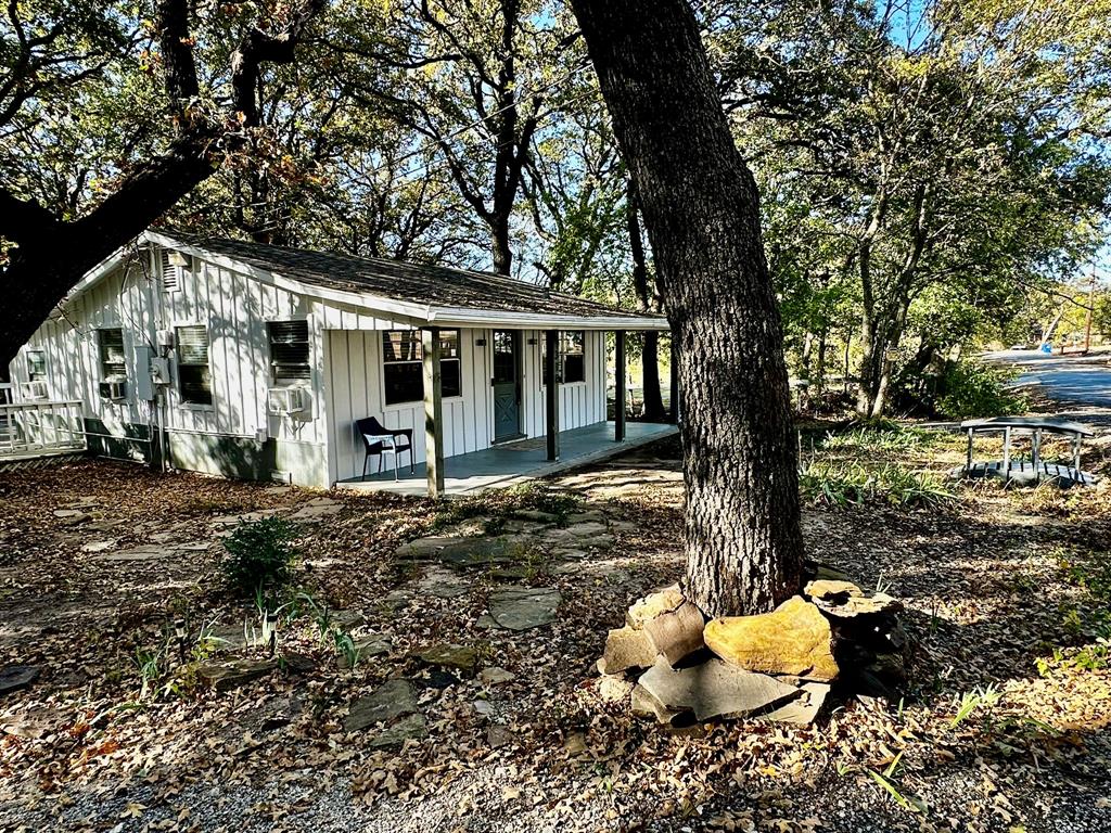 318 Windsor Drive Pottsboro, TX 75076 - Photo 10 of 18 a view of a house with a yard