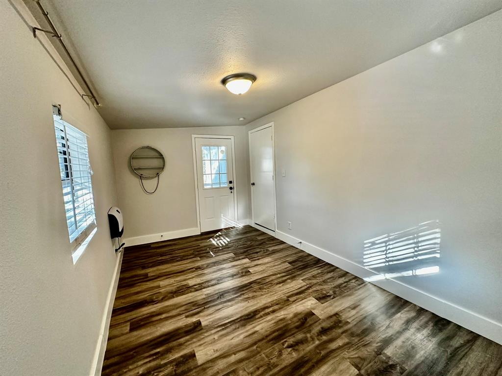 318 Windsor Drive Pottsboro, TX 75076 - Photo 15 of 18 a view of an empty room and window