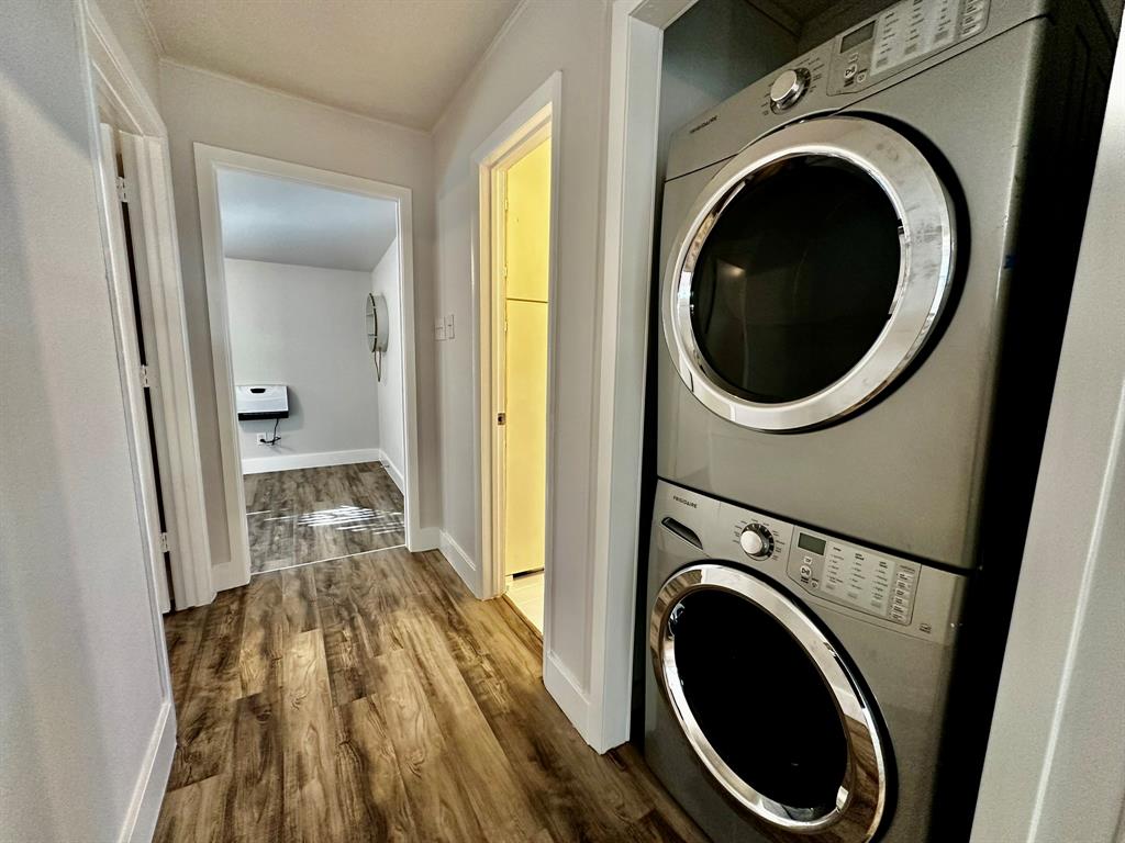 318 Windsor Drive Pottsboro, TX 75076 - Photo 6 of 18 a view of a hallway with washer and dryer