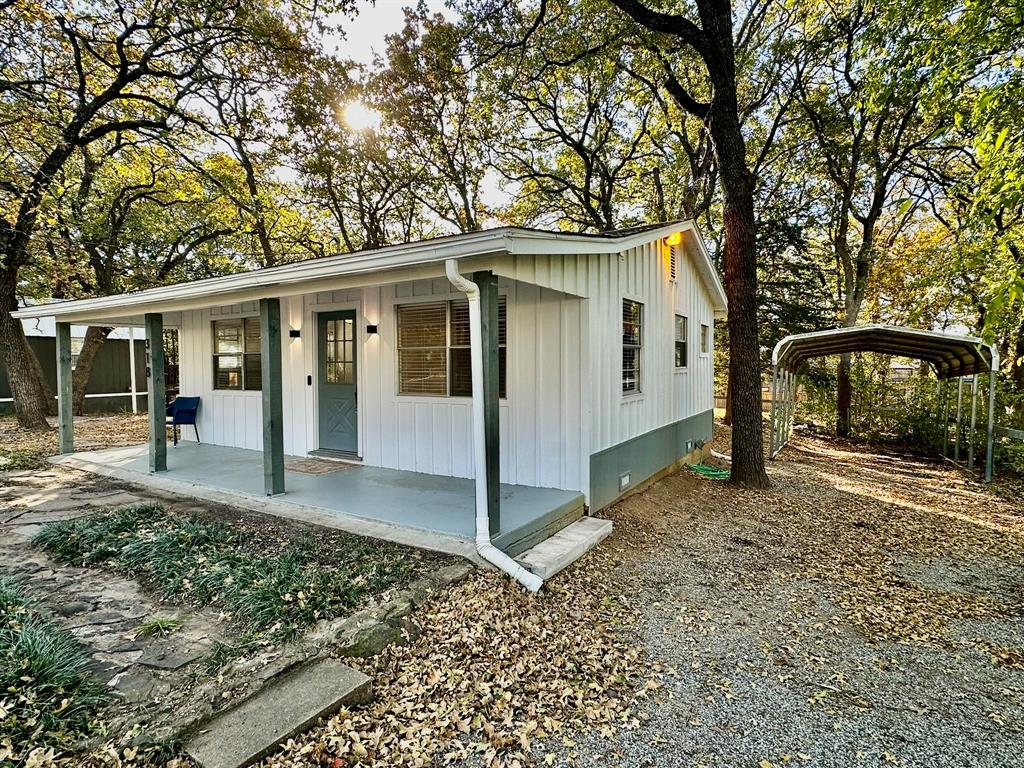 318 Windsor Drive Pottsboro, TX 75076 - Photo 9 of 18 a view of a house with a yard