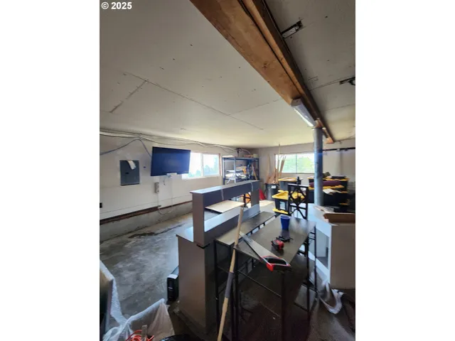 a view of a hallway with seating area