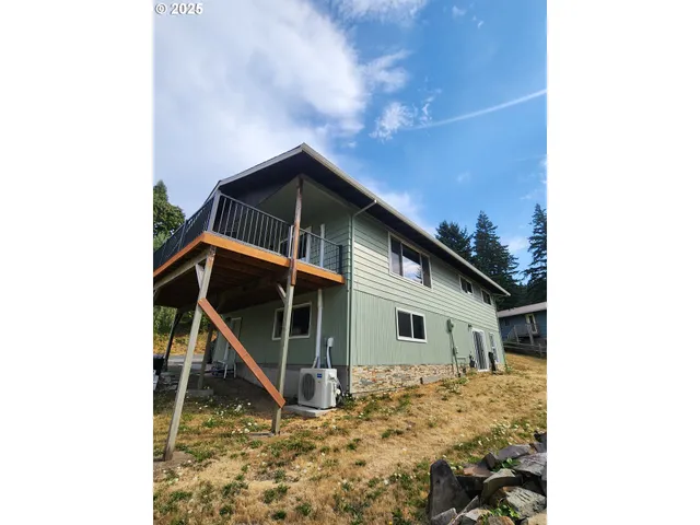 a house with trees in front of it