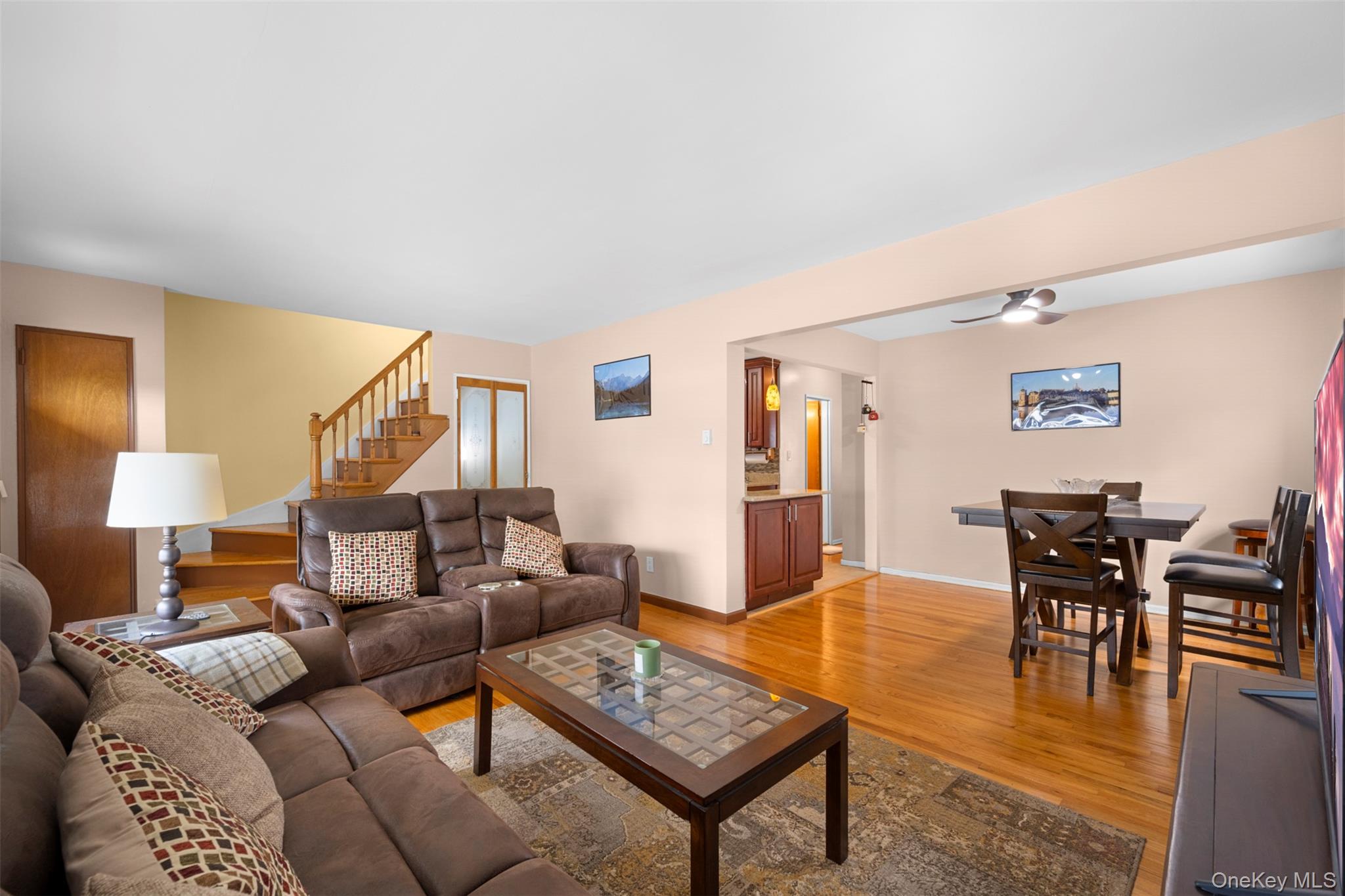 8807 Sabre Street Queens, NY 11427 - Photo 4 of 29 a living room with furniture and wooden floor