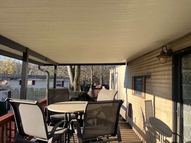 2795 East 28th Road Marseilles, IL 61341 - Photo 13 of 17 a view of a dining room with furniture window and outside view