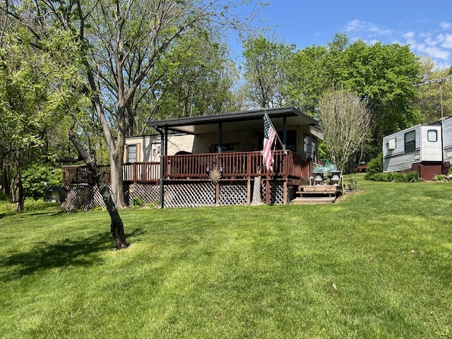 2795 East 28th Road Marseilles, IL 61341 - Photo 2 of 17 a view of outdoor space with deck and yard
