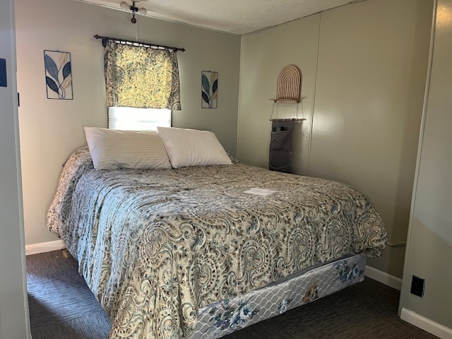 2795 East 28th Road Marseilles, IL 61341 - Photo 8 of 17 a large bed sitting in a bedroom next to a window