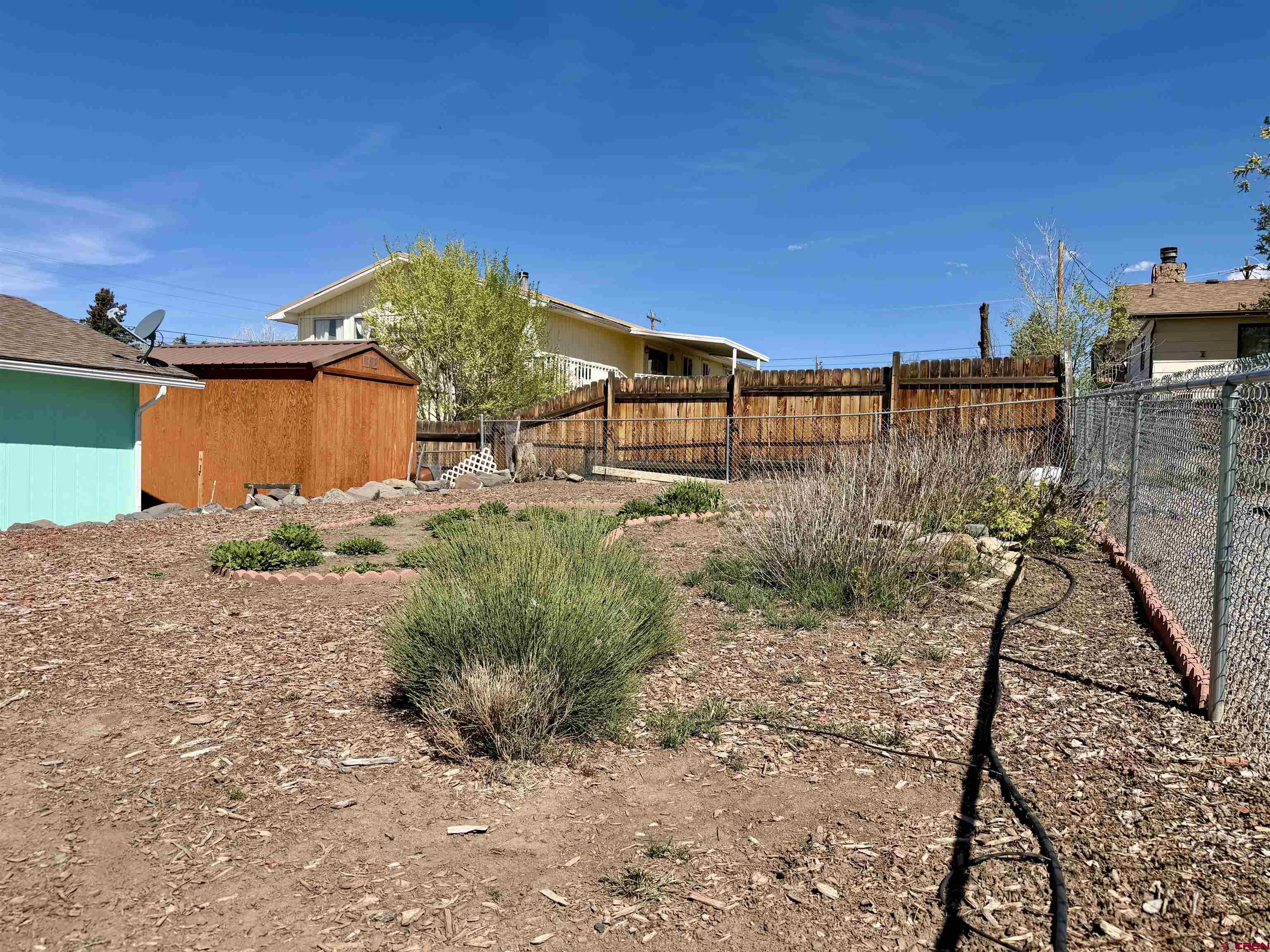265 Northwest 10th Street Cedaredge, CO 81413 - Photo 36 of 40 a view of a backyard