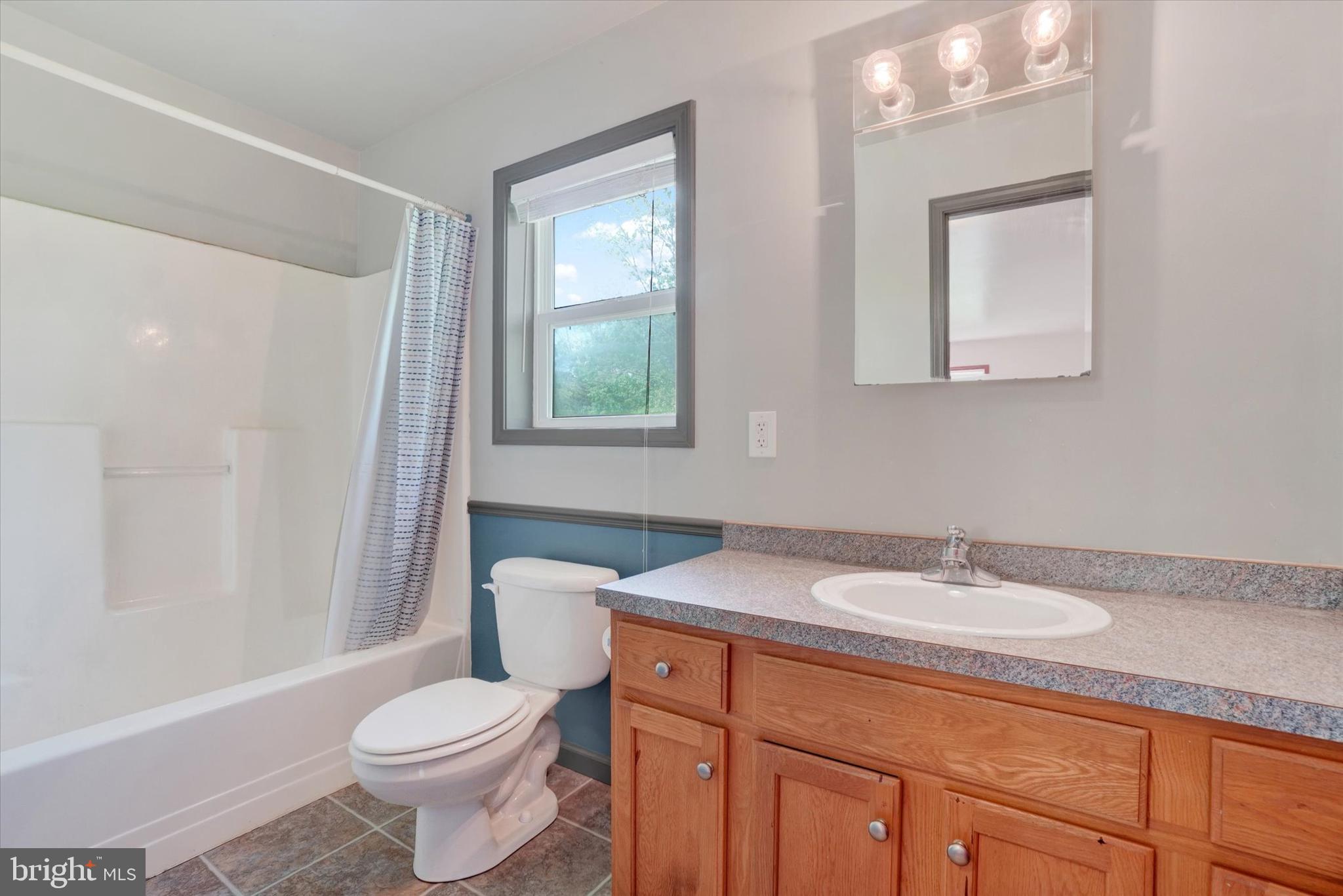 1055 Copenhaffer Road York, PA 17404 - Photo 11 of 38 a bathroom with a sink toilet and shower