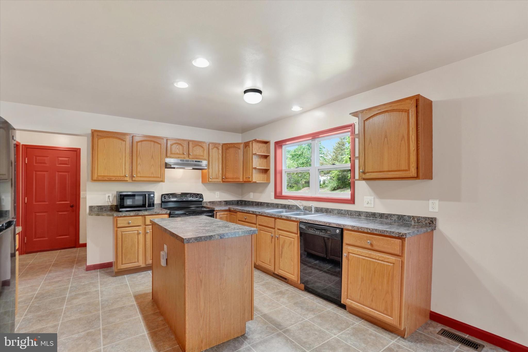 1055 Copenhaffer Road York, PA 17404 - Photo 18 of 38 a kitchen with stainless steel appliances granite countertop a stove a sink dishwasher and a refrigerator