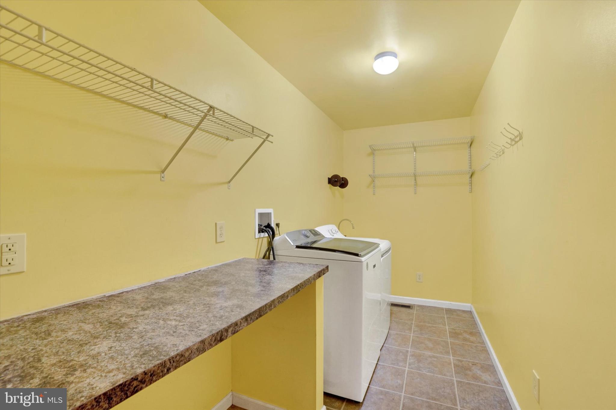 1055 Copenhaffer Road York, PA 17404 - Photo 27 of 38 a bathroom with a granite countertop sink and a mirror